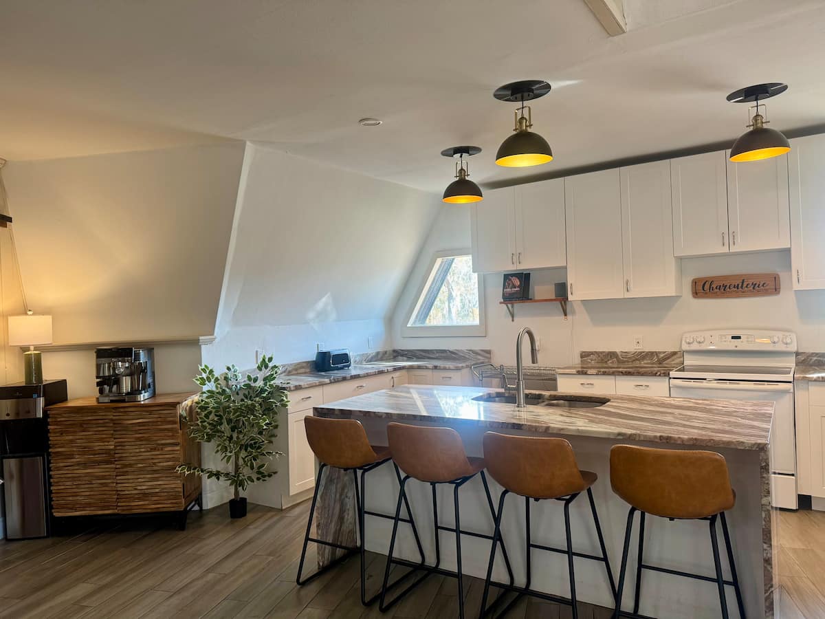 Upstairs loft bedroom overlooking living space