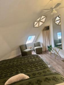 Bedroom with bed and seating