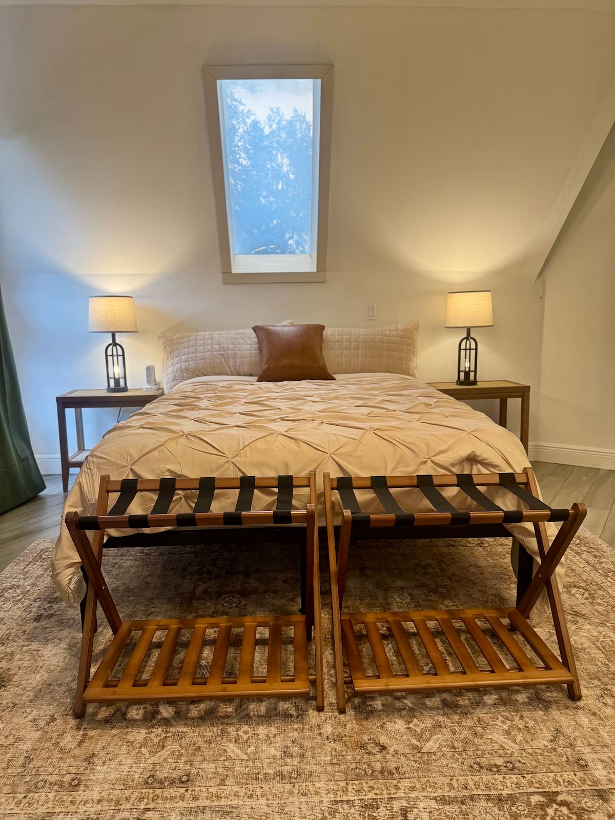 Upstairs suite bedroom with queen bed in the dome home